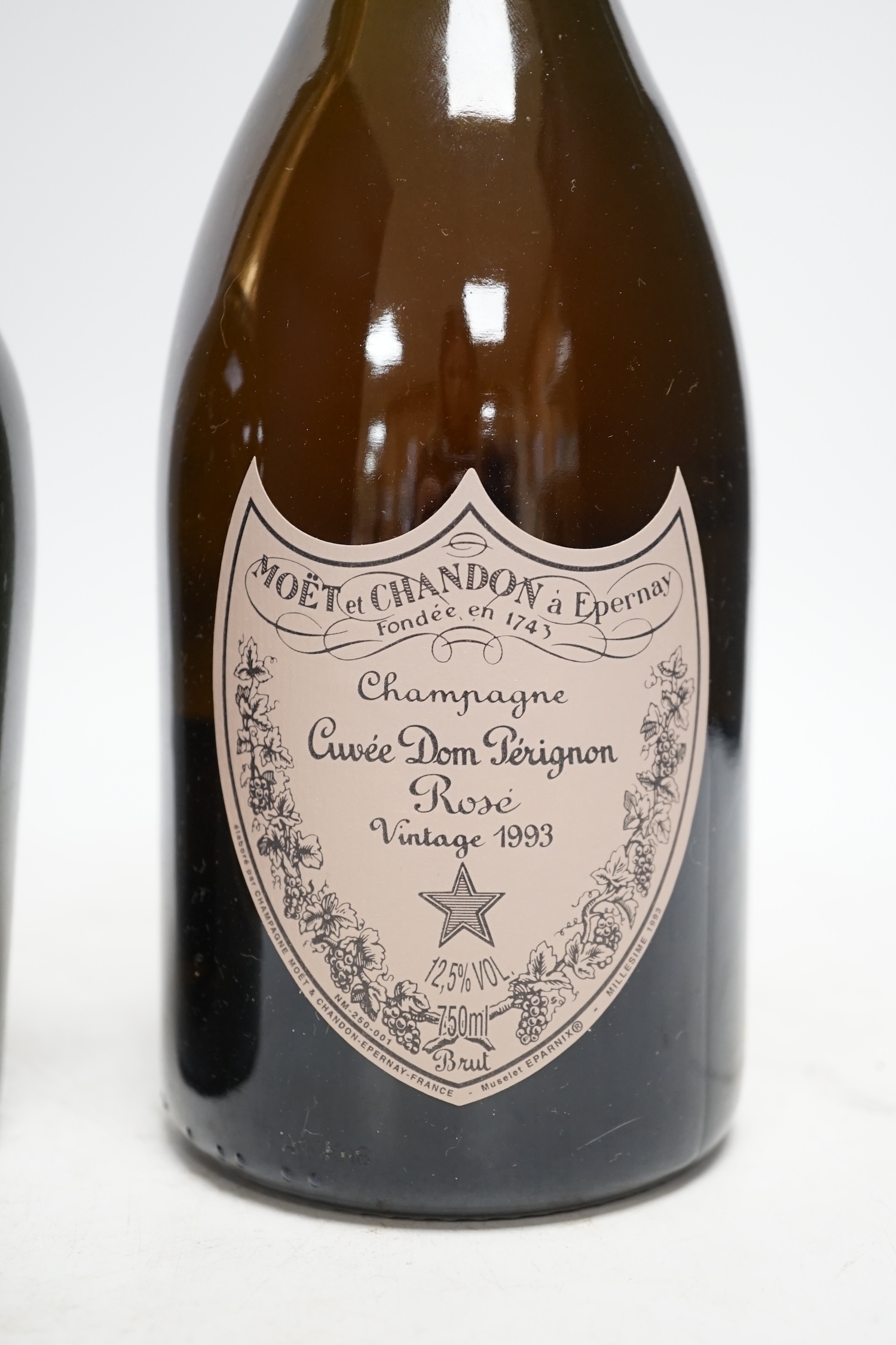 One bottle of Moet et Chandon Dom Perignon vintage champagne 1993 and one bottle of Laurent Perrier, both boxed. Condition - good